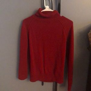 Red turtleneck sweater